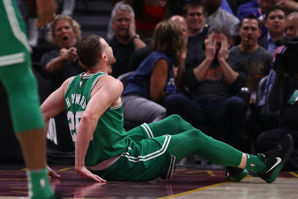 Gordon Hayward sits on the floor after being injured while playing the Cleveland Cavaliers. (Getty)