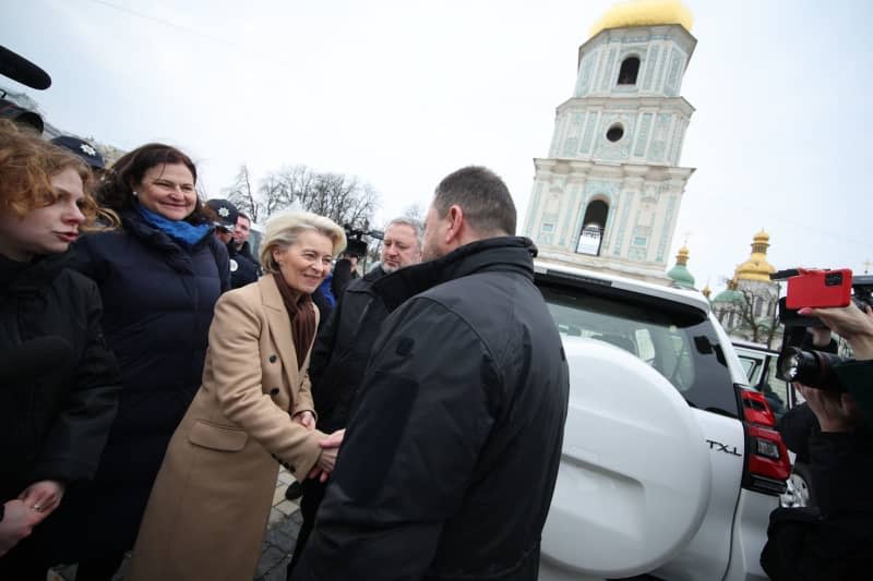 European Commission President Ursula von der Leyen (C) visits Ukraine on the second anniversary of the start of the conflict with Russia. Christophe Licoppe/European Commission/dpa