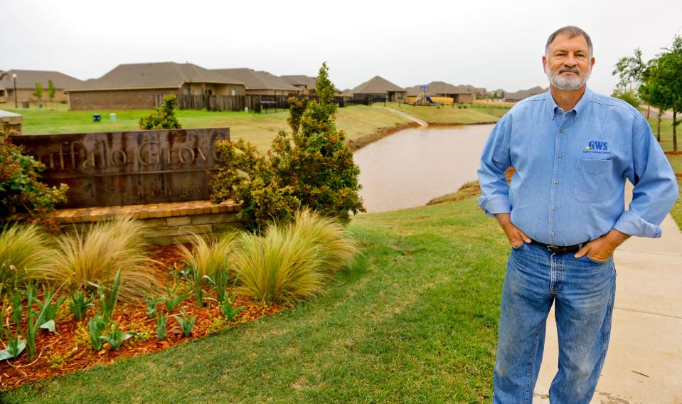 Kelly Parker, CEO of Guaranteed Watt Saver, and a developer, at the Village Verde neighborhood, designed and developed to be environmentally friendly, in northwest Oklahoma City.