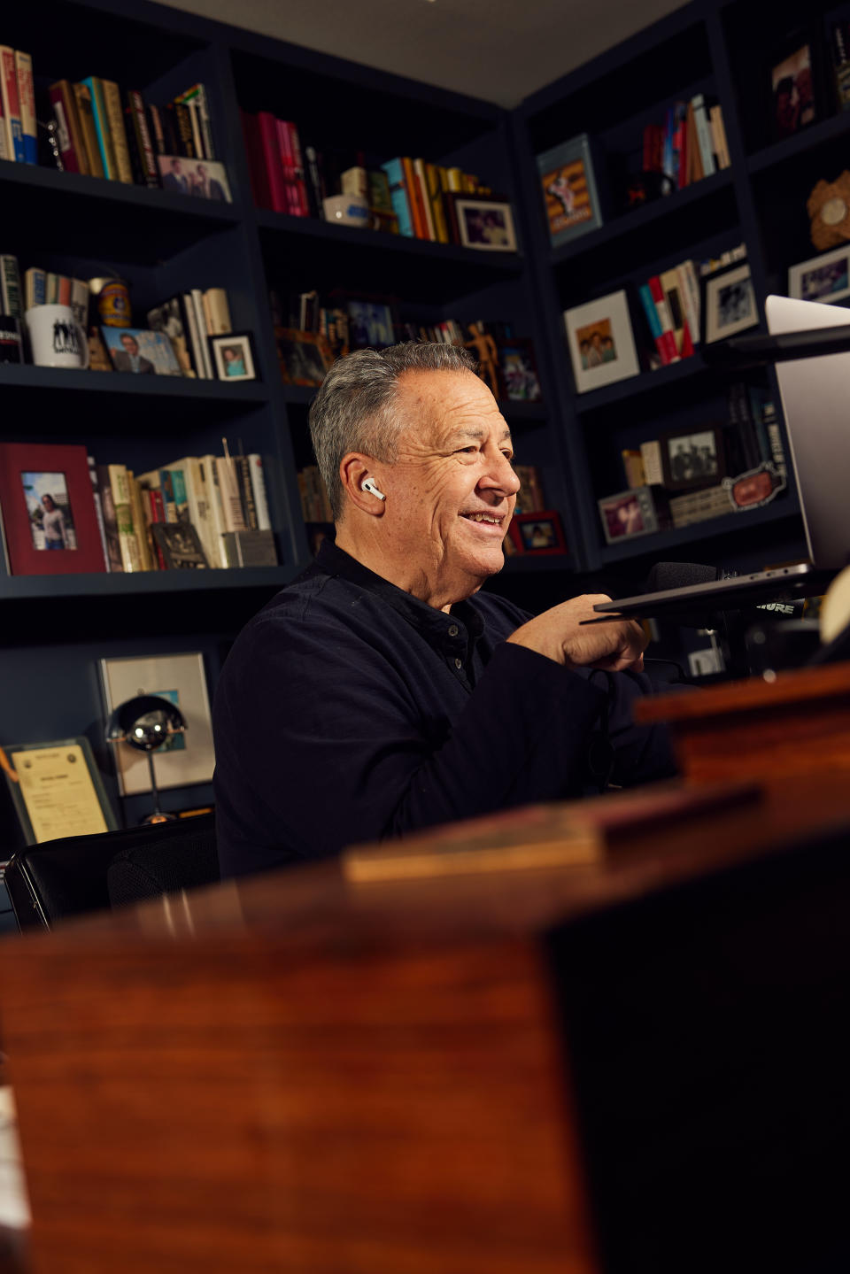 Josh Mankiewicz records a podcast at home in December. Mankiewicz joined “Dateline” in 1995 as it made its pivot to true crime, but it took him a while to understand the genre's growing appeal. (Ryan Young for The Washington Post)