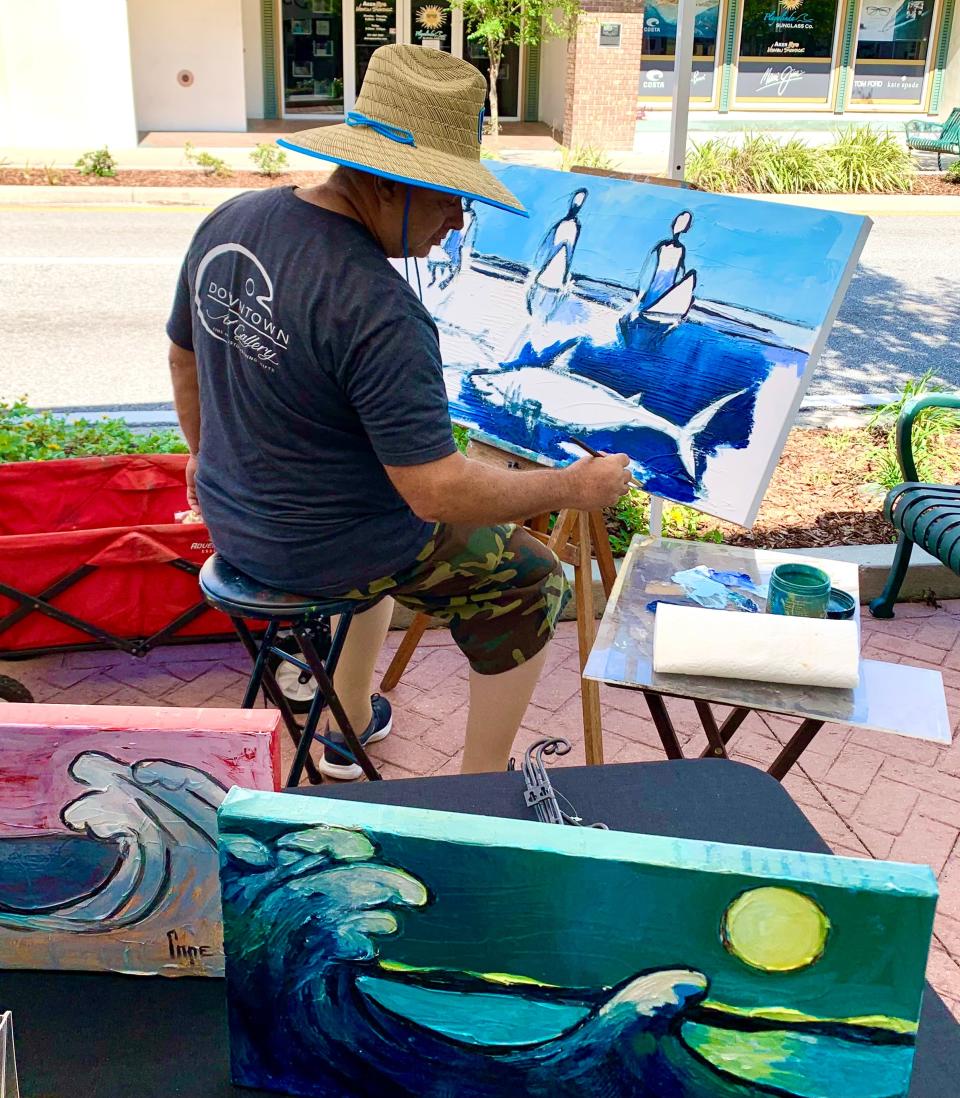 Art spills out unto the street during the “Art in Bloom” celebration on Saturday, March 30 at Downtown Art Gallery in Titusville.