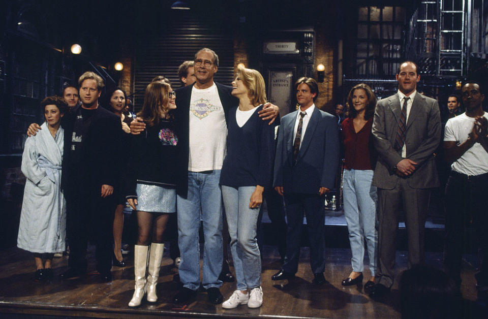 Chevy Chase on stage with the cast of "SNL"