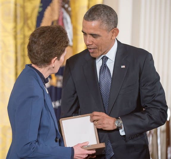 Tam O'Shaughnessy, Sally Ride's life partner and chair of Sally Ride Science, is seen with President Barack Obama accepting the Presidential Medal of Freedom on behalf of Ride, Wednesday, Nov. 20, 2013 at the White House.