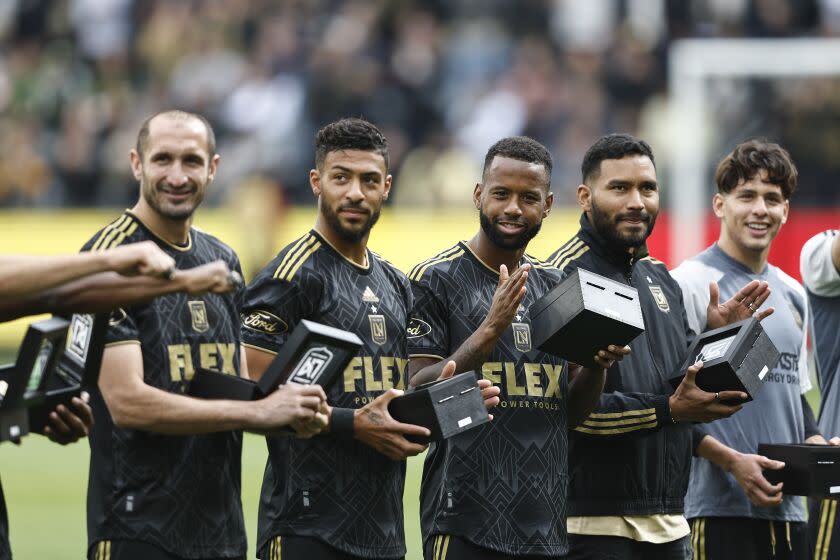 LOS ANGELES, CALIFORNIA - MARCH 04: Los Angeles FC players react as they accept their championship rings.