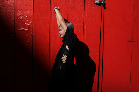 Storm Hartley, 20, a student at Tisch School of the Arts, poses for a portrait in the Manhattan borough of New York, U.S., September 3, 2018. REUTERS/Caitlin Ochs