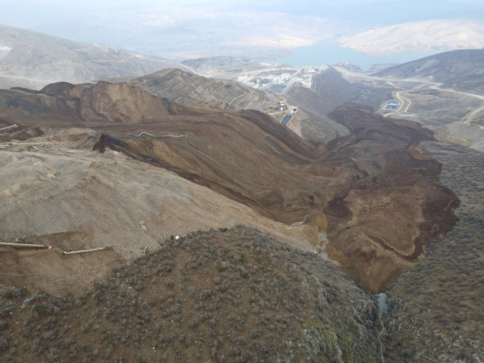 A general view of the landslide at the Copler gold mine near Ilic village, eastern Turkey, Wednesday, Feb. 14, 2024. Hundreds of rescuers on Wednesday pressed ahead with efforts to search for at least nine workers trapped at a gold mine in eastern Turkey that was engulfed by a massive landslide. (Ugur Yildirim/Dia images via AP)