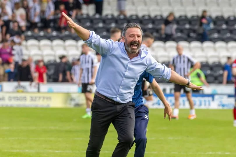 Taking flight Derek McInnes celebrates their Europa League berth at full-time -Credit:Jeff Holmes