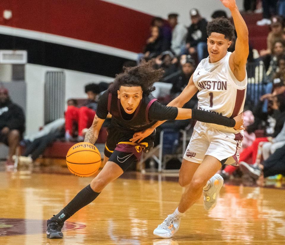 Edison's Leon Mills Jr., left, drives on Weston Ranch's Xavion Bell during a boys varsity basketball game at Weston Ranch in Stockton on Wednesday, Jan. 4, 2023.