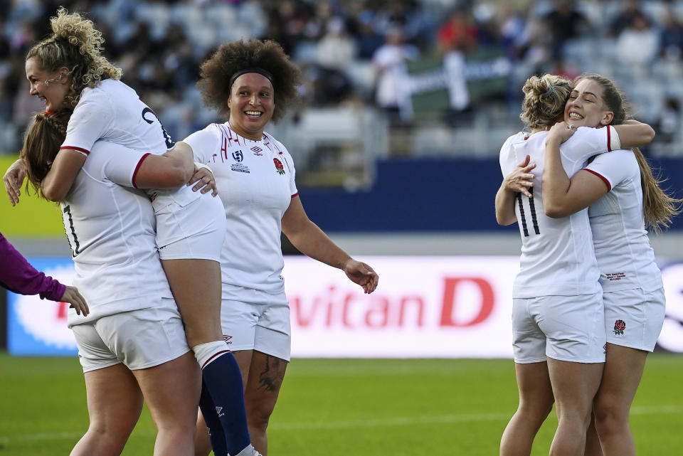 England players celebrate after defeating Canada in their women's rugby World Cup semifinal at Eden Park in Auckland, New Zealand, Saturday, Nov.5, 2022. (Andrew Cornaga/Photosport via AP)