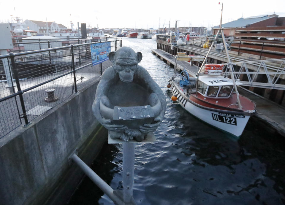 A wishing well, sculpted as a monkey at the Marina in Hartlepool, England, Monday, Nov. 11, 2019. Legend has it that during the Napoleonic Wars of the early 19th century, a shipwrecked monkey was hanged by the people of Hartlepool, believing him to be a French spy. Britain's political parties are battling to win Hartlepool and places like it: working-class former industrial towns whose voters could hold the key to 10 Downing Street, the prime minister's office. (AP Photo/Frank Augstein)