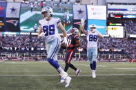 Dallas Cowboys tight end Blake Jarwin (89) runs through the end zone on his touchdown during the first half of an NFL football game against the New England Patriots, Sunday, Oct. 17, 2021, in Foxborough, Mass. (AP Photo/Michael Dwyer)