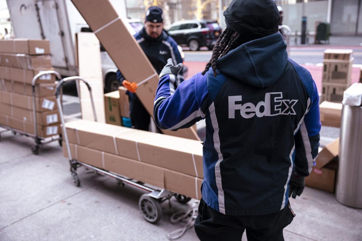 FedEx (FDX) Jumps After Boosting Forecast as Cost Cuts Take Hold - Bloomberg