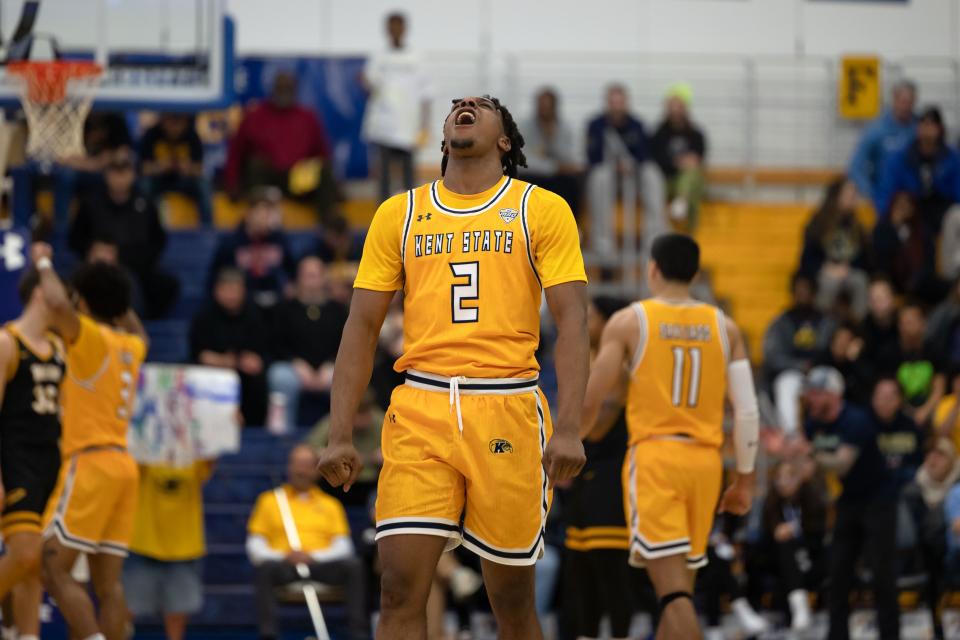 Kent State guard Malique Jacobs celebrates at the end of the game as the Golden Flashes defeat the University of Toledo Rockets 75-63, Tuesday, Jan. 10, 2023 at the Kent State M.A.C. Center.