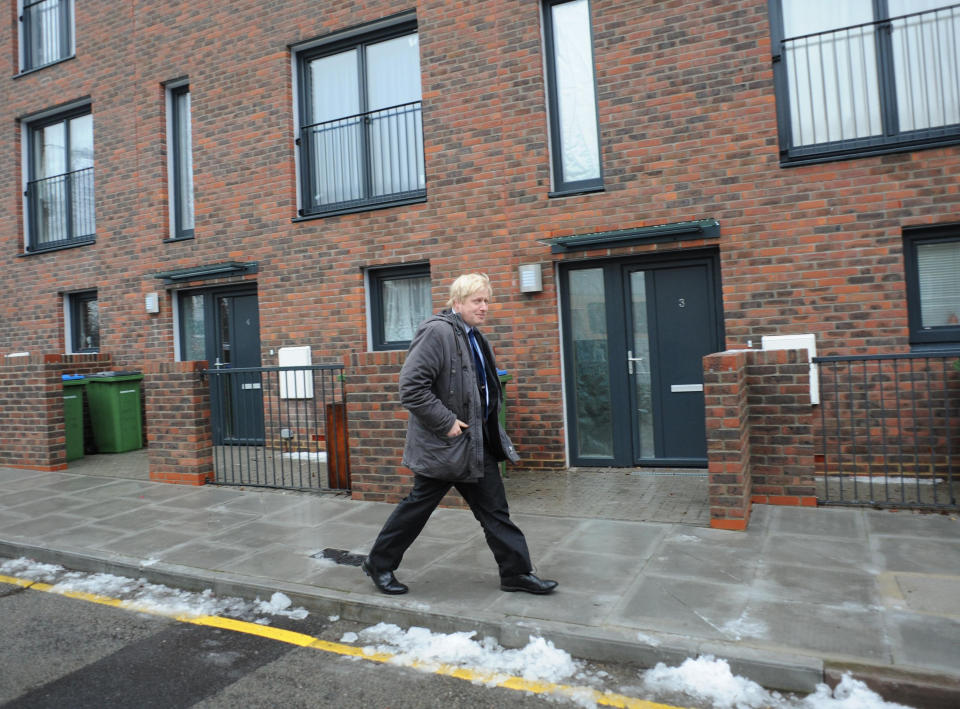 Mayor of London Boris Johnson arrives at the Gallons Close development in Charlton, south east London, where he saw some of the new affordable houses and announced that 50,000 homes would be made available to Londoners by 2012. 