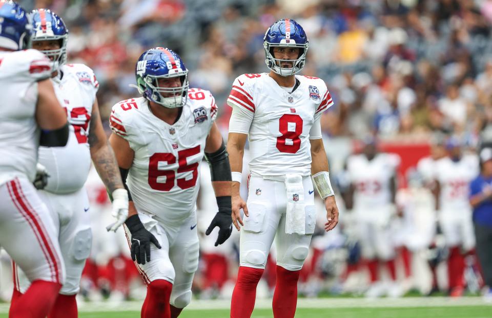 Aug 17, 2024; Houston, Texas, USA; New York Giants quarterback Daniel Jones (8) reacts after a play during the second quarter against the Houston Texans at NRG Stadium. Mandatory Credit: Troy Taormina-USA TODAY Sports