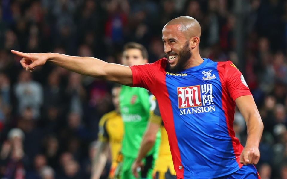 <p>Andros Townsend celebrates making it 1-0</p>