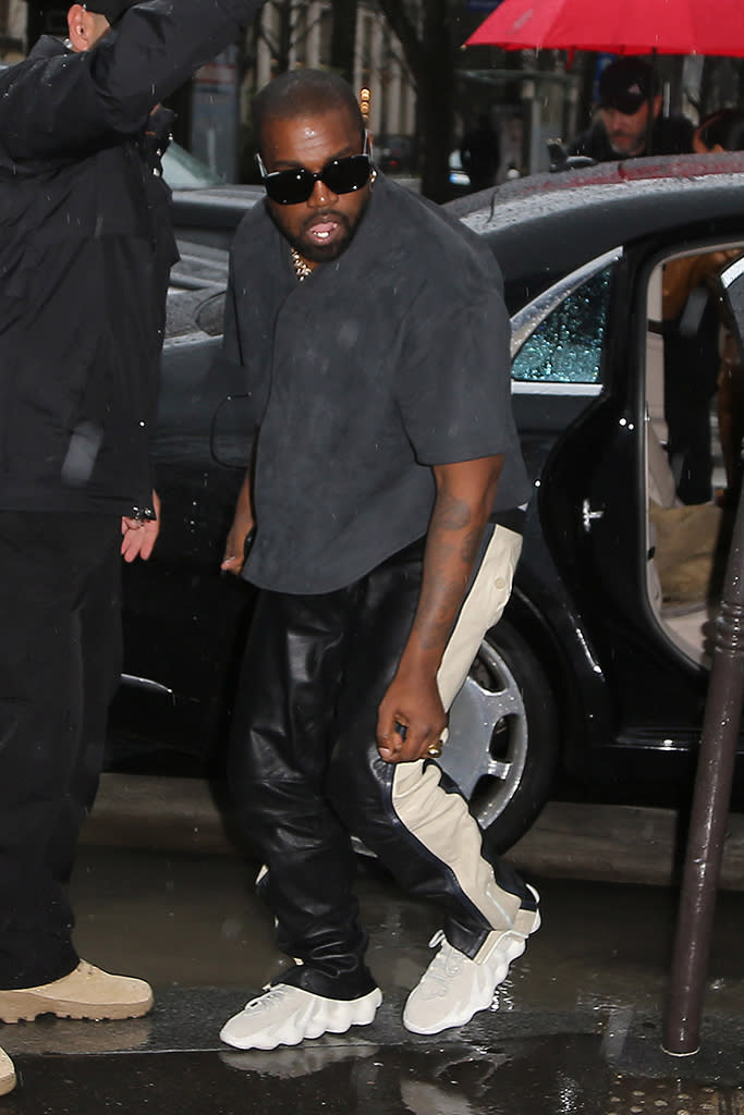 Kanye West wearing Adidas Yeezy 450. - Credit: KCS Presse/MEGA