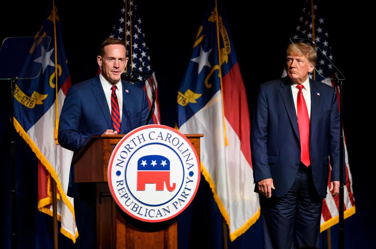 <p>Former U.S. President Donald Trump listens to Ted Budd announce he's running for the NC Senate at the NCGOP state convention on June 5, 2021 in Greenville, North Carolina</p> (Melissa Sue Gerrits/Getty Images)