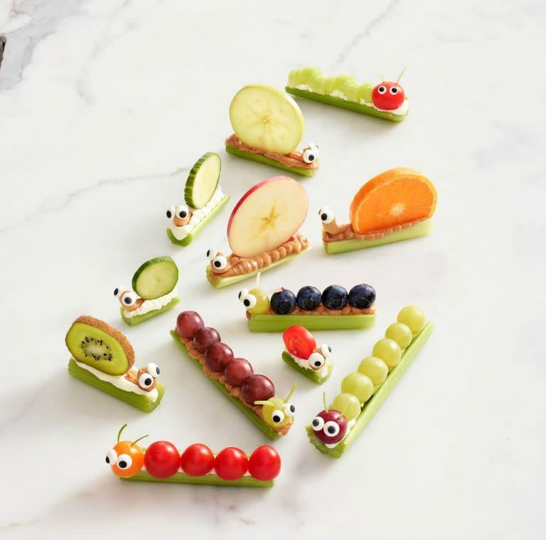 <p>Sneak some veggies into the party with these celery snacks.</p><p>Get the <strong><a href="https://www.womansday.com/food-recipes/food-drinks/recipes/a55811/celery-snails-caterpillars-recipe/" rel="nofollow noopener" target="_blank" data-ylk="slk:Celery Snails & Caterpillars recipe;elm:context_link;itc:0;sec:content-canvas" class="link ">Celery Snails & Caterpillars recipe</a></strong>.</p>