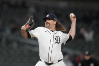 Detroit Tigers pitcher Andrew Chafin throws during the eighth inning of a baseball game against the Minnesota Twins, Friday, April 12, 2024, in Detroit. (AP Photo/Carlos Osorio)