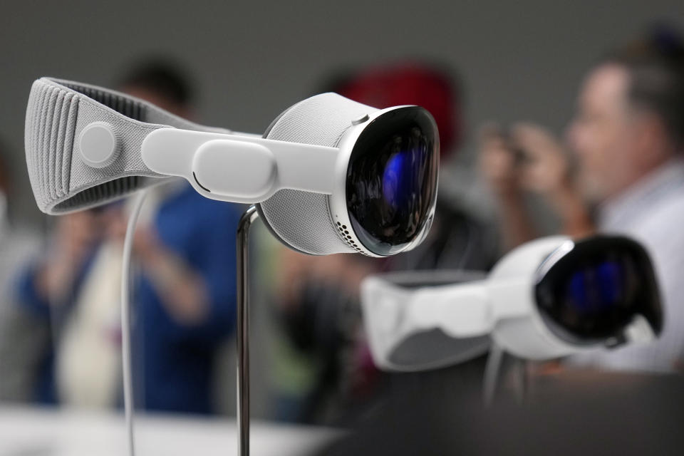 The Apple Vision Pro headset is displayed in a showroom on the Apple campus in Cupertino, Calif., at the company's annual developers conference, Monday, June 5, 2023. (AP Photo/Jeff Chiu)