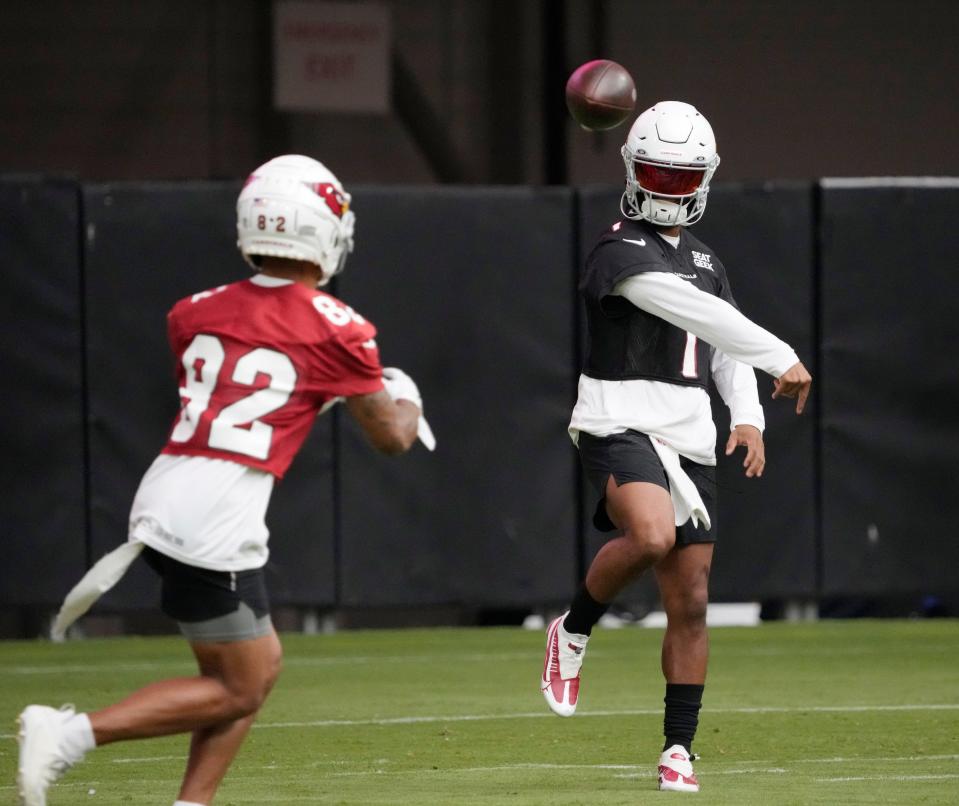 Arizona Cardinals quarterback Kyler Murray (1) throws a pass to wide receiver Andre Baccellia (82) during training camp at State Farm Stadium in Glendale on July 27, 2022.