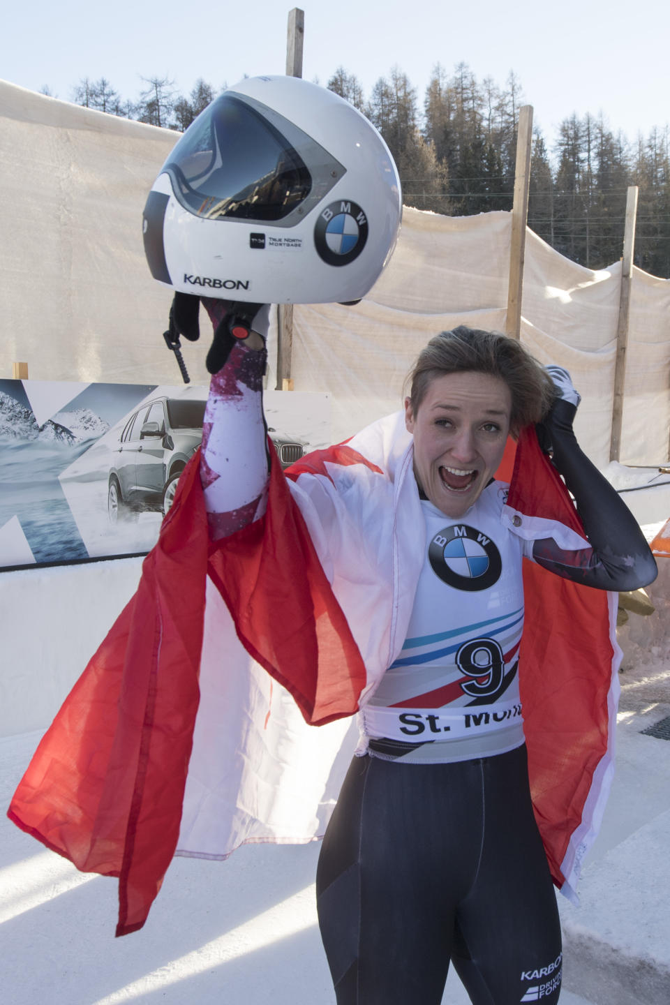 Winner Mirela Rahneva from Canada celebrates during the women's skeleton World Cup in St. Moritz, Switzerland, on Friday, Jan. 20, 2017. (Urs Flueeler/Keystone via AP)