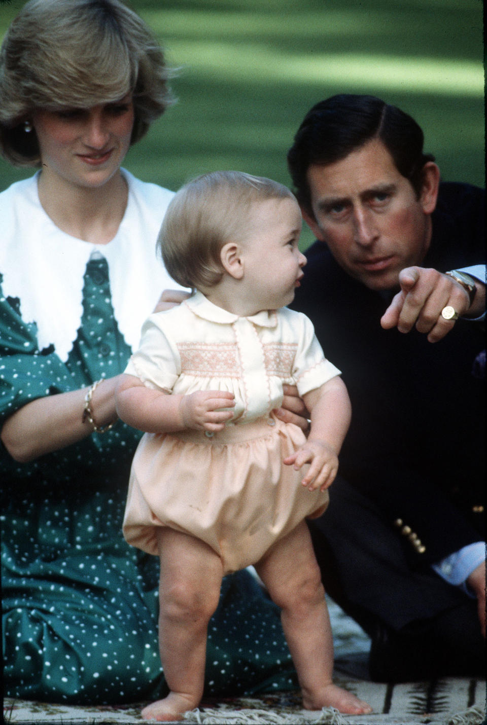 <p>Princess Diana was given a gold bracelet by Prince Charles, and on every anniversary during their first 10 years of marriage, the royal would give his wife a new charm to add to the piece. Here, Princess Diana is pictured with Prince William and Prince Charles in New Zealand. (Photo: PA) </p>