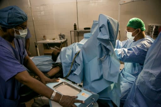 Professor Yoel Rantomalala and his team perform repair surgery on a fistula patient at Monja Joana Hospital. Around two million women around the world have the condition