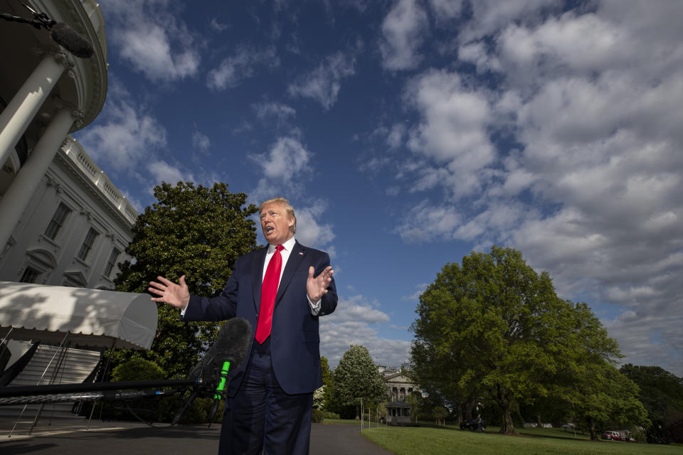 FILE - In this May 1, 2020, file photo President Donald Trump speaks with reporters as he departs the White House in Washington. (AP Photo/Alex Brandon, File)