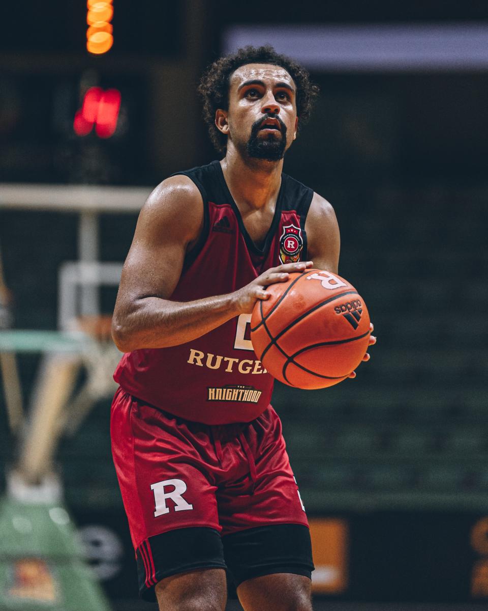 Noah Fernandes shooting free throws during a Rutgers basketball game in Senegal