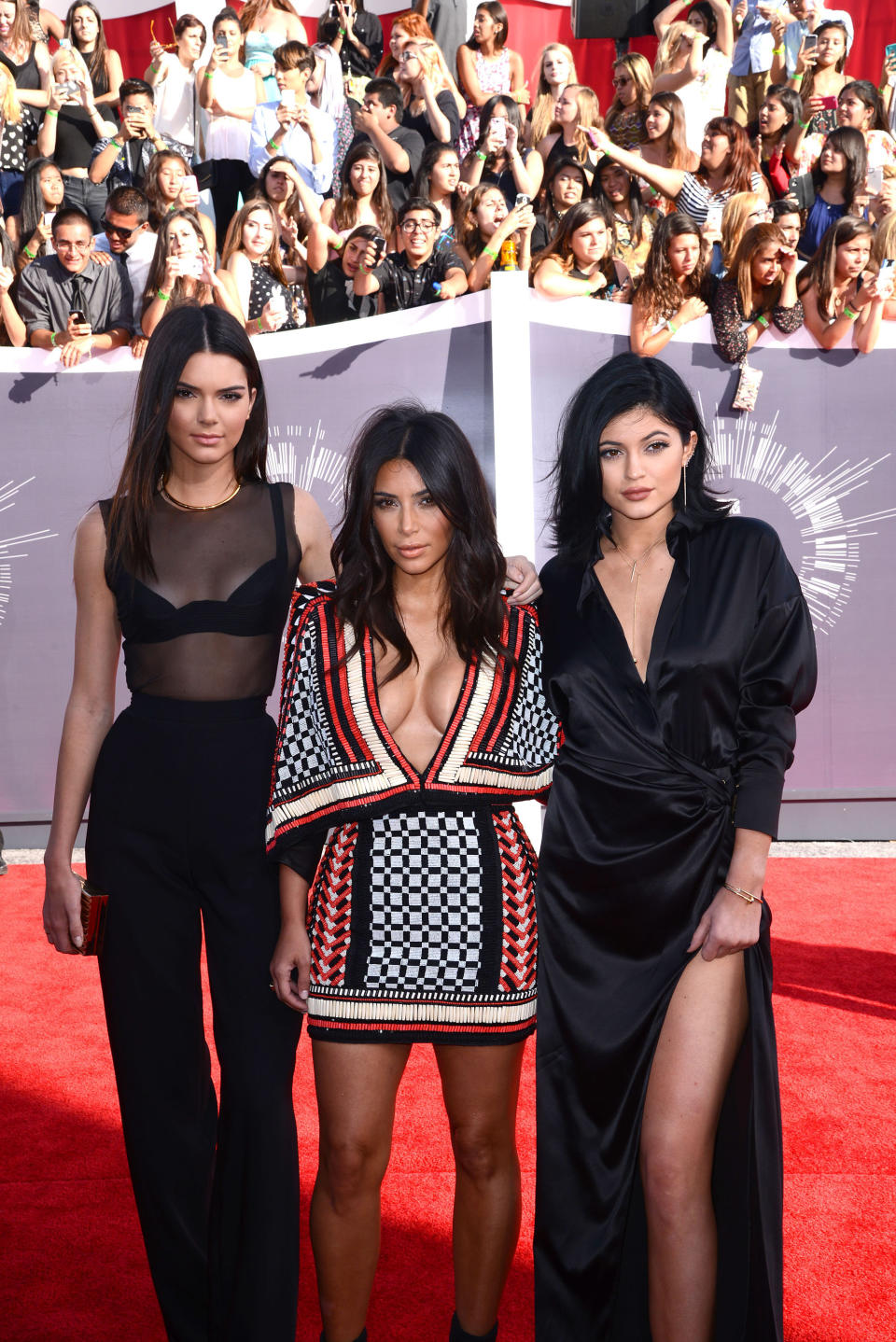 INGLEWOOD, CA - AUGUST 24:  Kendall Jenner, Kim Kardashian and Kylie Jenner arrive to the 2014 MTV Video Music Awards at The Forum on August 24, 2014 in Inglewood, California.  (Photo by C Flanigan/Getty Images)