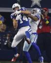 Indianapolis Colts wide receiver Alec Pierce (14) makes a touchdown catch against Dallas Cowboys' Kelvin Joseph (1) during the second half of an NFL football game, Sunday, Dec. 4, 2022, in Arlington, Texas. (AP Photo/Ron Jenkins)