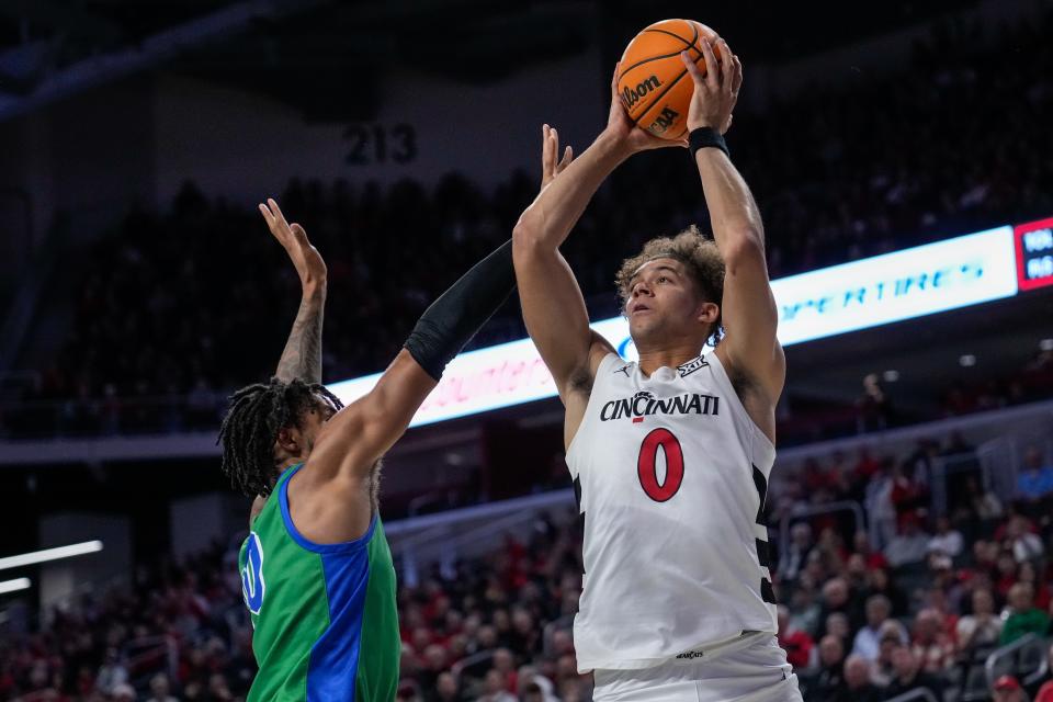 Cincinnati Bearcats guard Dan Skillings Jr. (0) shoots vs. Florida Gulf Coast Sunday at Fifth Third Arena. Skillings was held to three points but pulled down 12 rebounds.