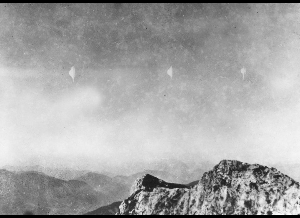 This photograph, reproduced from the quarterly UFO periodical Flying Saucers International in Los Angeles, shows silvery white flying objects as seen by photographer Erich Kaiser while descending from Reichenstein mountain in Austria on Aug. 3, 1954. (AP Photo)
