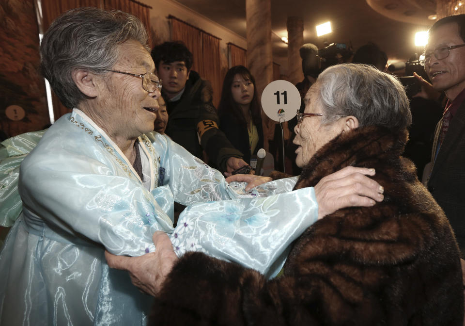 South Korean Kim Sung-yoon, 96, right, meets with her North Korean sister Kim Seok Ryu, 80, during the Separated Family Reunion Meeting at Diamond Mountain resort in North Korea, Thursday, Feb. 20, 2014. The rival nations struck a deal last week to go ahead with brief meetings of war-divided families, though there's wariness in Seoul that Pyongyang could back out again. As they waited anxiously in the days leading up to the trip, many elderly Koreans had been unsure whether they would be able to see their long-lost relatives' faces before they die. (AP Photo/Yonhap, Lee Ji-eun) KOREA OUT