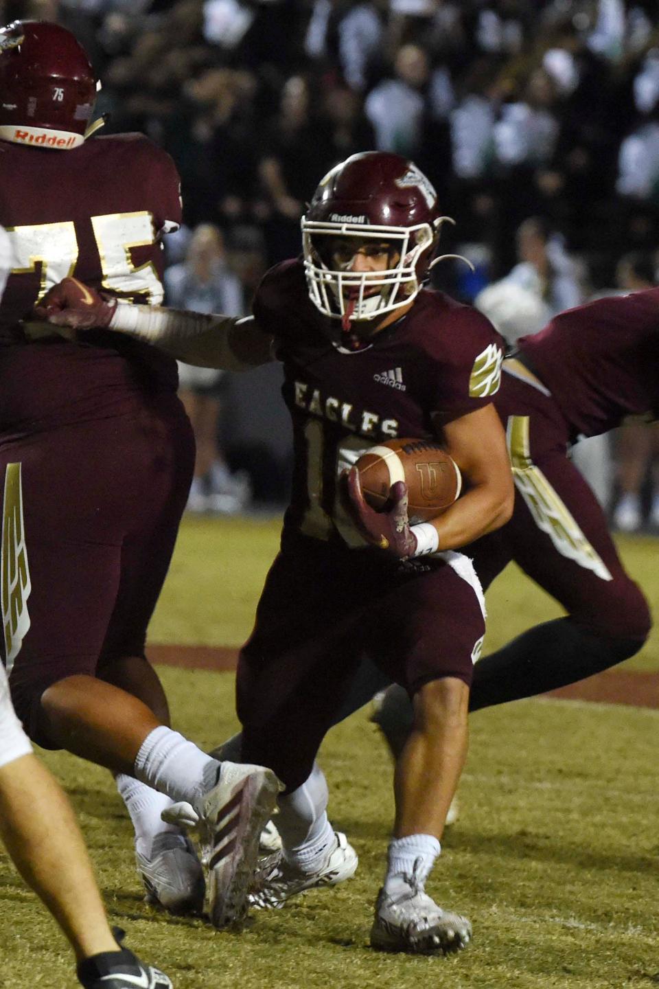 Niceville High School's Deangelo Shorts runs the ball during the Eagles district home game against Mosley High School on Thursday, Oct. 27, 2022.