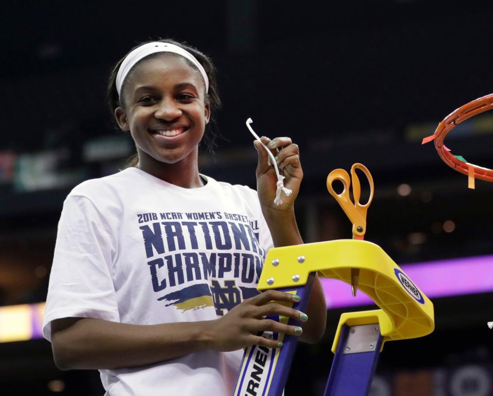 Jackie Young celebrates in April, 2018 after helping the University of Notre Dame to a national title.