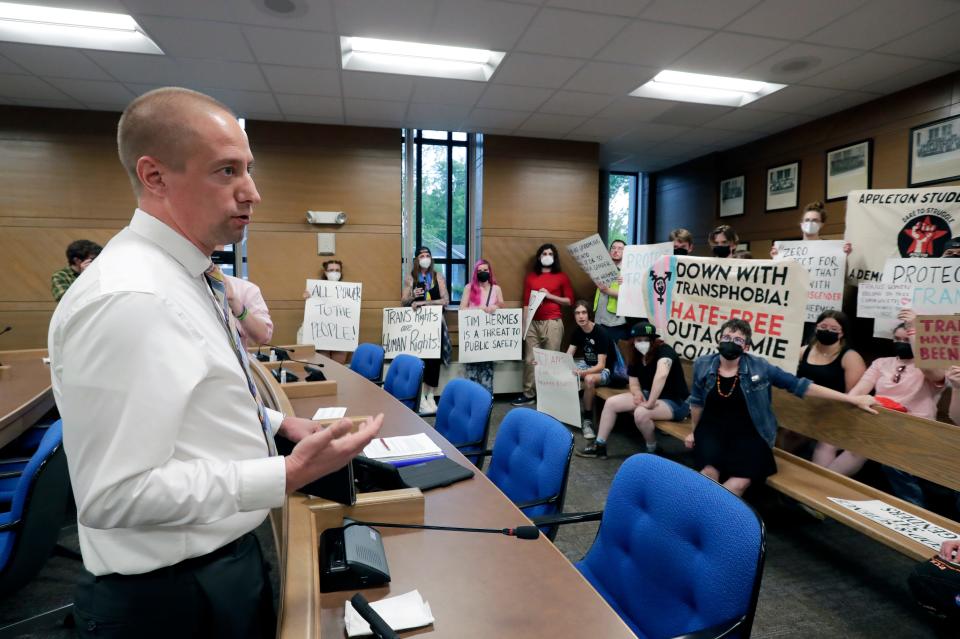 Outagamie County Board member Steve Thiede talks with transgender rights activists and citizens during an Outagamie County Board meeting at the Outagamie County Government Center on Tuesday, May 23, 2023, in Appleton, Wis. At a May 9 county board meeting, board member Timothy Hermes made transphobic comments regarding transgender people and their use of bathrooms that align with their gender, calling them "disgusting."