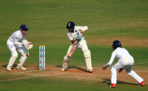 Cricket - India v England - Fourth Test cricket match - Wankhede Stadium, Mumbai, India - 9/12/16. India's Cheteshwar Pujara plays a shot. REUTERS/Danish Siddiqui