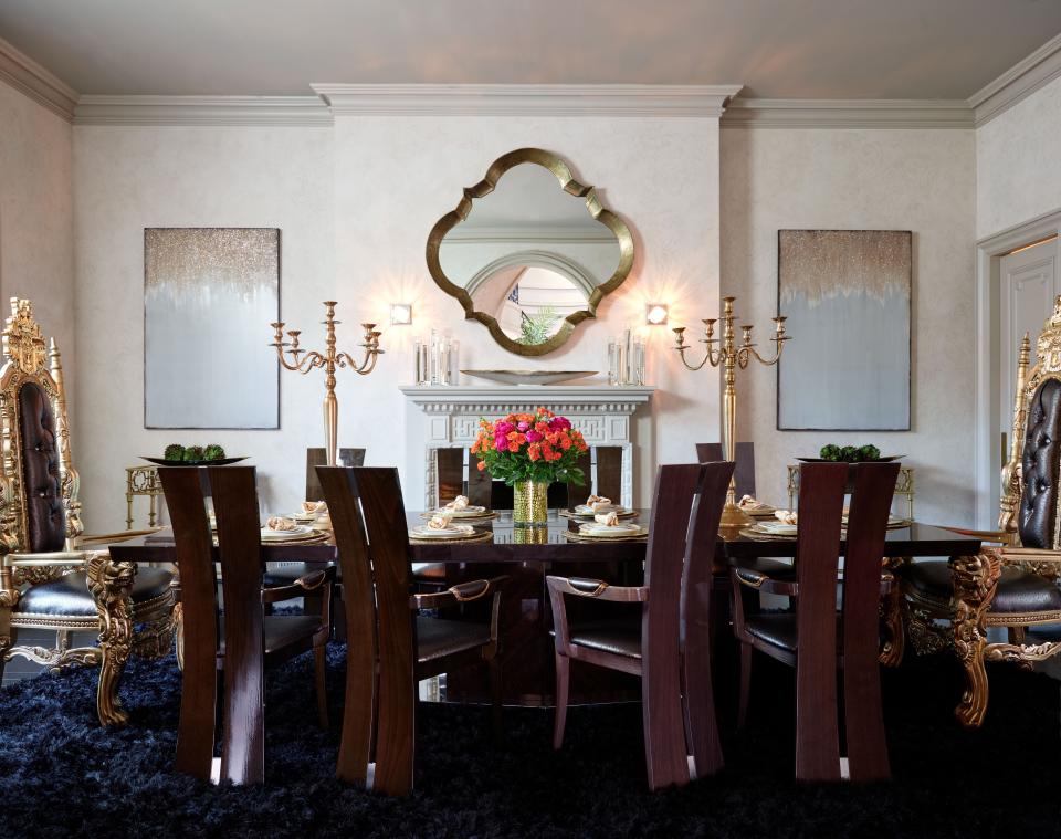 “I was inspired by my visits to the Middle East,” says Tyrese. The table and chairs were sourced in Los Angeles, and Wishengrad had them reupholstered in ostrich. The gilded thrones are custom-made. Shag carpet by Memo Fabric & Rug. Scalloped mirror by Uttermost.