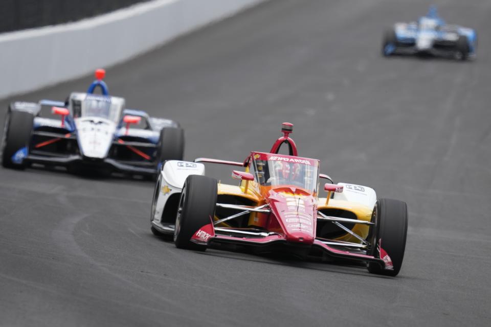 Josef Newgarden drives into a turn during a practice session for the Indianapolis 500 auto race at Indianapolis Motor Speedway, Monday, May 20, 2024, in Indianapolis. (AP Photo/Darron Cummings)