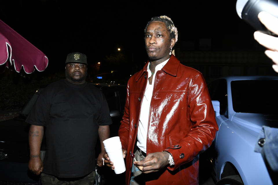 Young Thug Wearing Red Coat And White Shirt