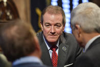 Kentucky Speaker of The House David Osborne, R-Prospect, confers with fellow representatives during the opening of a special session at the Kentucky state Capitol in Frankfort, Ky., Monday, Dec. 17, 2018. Days after losing at the state Supreme Court, Kentucky's Republican governor called the legislature back in session Monday to try again to reshape the state's troubled public pension system. (AP Photo/Timothy D. Easley)