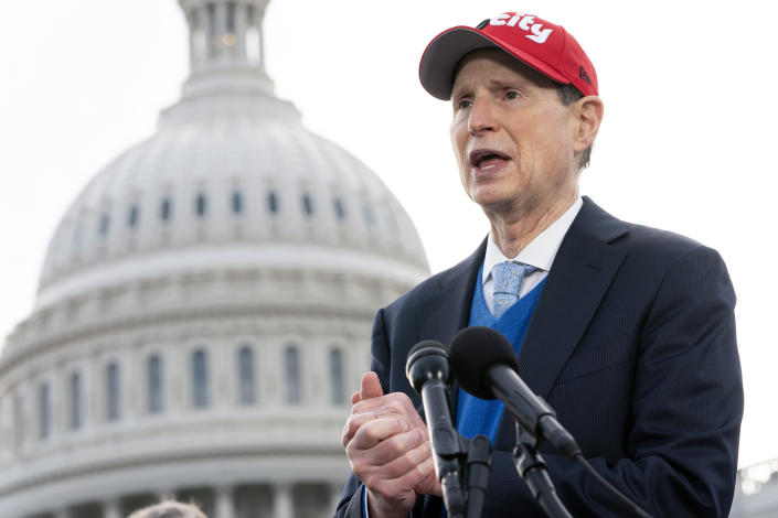 FILE - Sen. Ron Wyden, D-Ore., speaks during a news conference, on Dec. 15, 2021, on Capitol Hill in Washington. Child welfare officials in Oregon will stop using an algorithm to help decide which families are investigated by social workers, opting instead for an entirely new process that officials said will make more racially equitable decisions. Wyden said he had long been concerned about the algorithms used by his state’s child welfare system and reached out to the department again following an AP story to ask questions about racial bias – a prevailing concern with the growing use of artificial intelligence tools in child protective services. (AP Photo/Jacquelyn Martin, File)