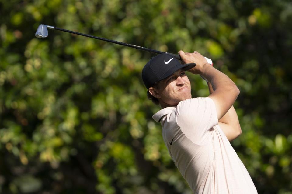 Cameron Champ hits his tee shot on the 11th hole during the first round of the Sony Open in Hawaii golf tournament at Waialae Country Club. Mandatory Credit: Kyle Terada-USA TODAY Sports