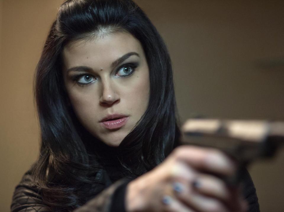 Adrianne Palicki as Ms. Perkins in "John Wick."