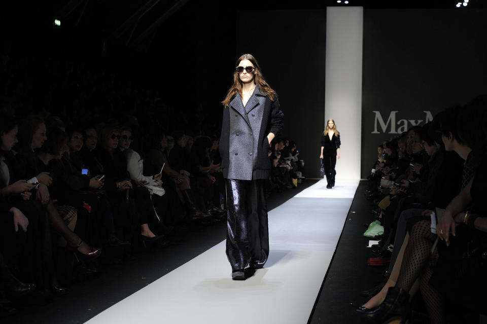 A model wears a creation for Max Mara women's Fall-Winter 2013-14 collection, part of the Milan Fashion Week, unveiled in Milan, Italy, Thursday, Feb. 21, 2013. (AP Photo/Giuseppe Aresu)