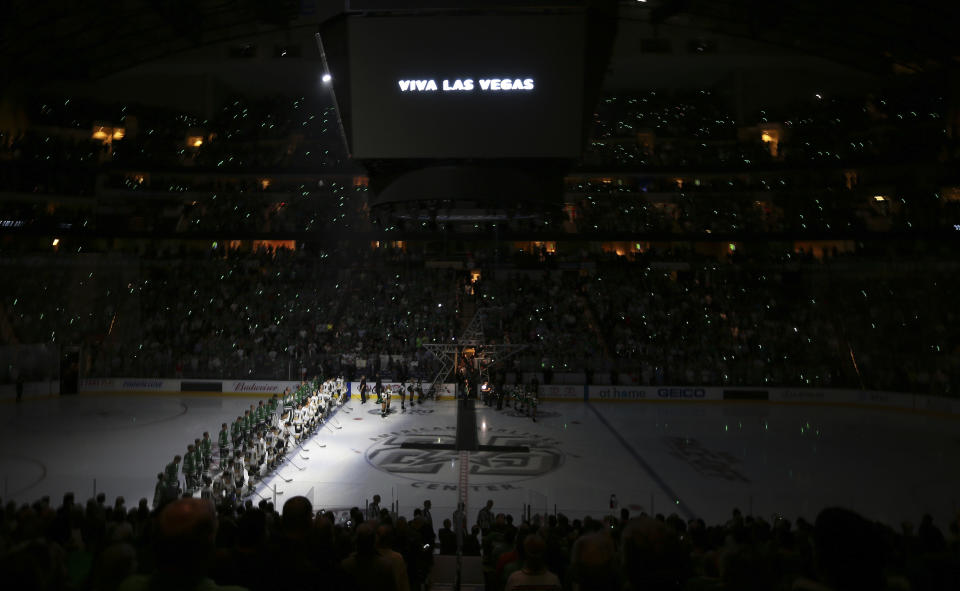 The Dallas Stars and Vegas Golden Knights stood together to honour those who lost their lives in Sunday’s horrific attack in Las Vegas. (AP Photo/LM Otero)