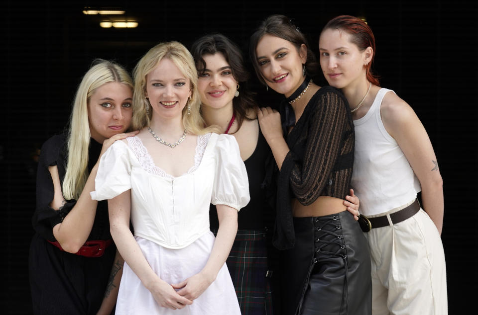 Georgia Davies, from left, Emily Roberts, Abigail Morris, Aurora Nishevci and Lizzie Mayland of the indie rock band The Last Dinner Party pose for a portrait, Tuesday, Nov. 7, 2023, in Los Angeles. (AP Photo/Chris Pizzello)